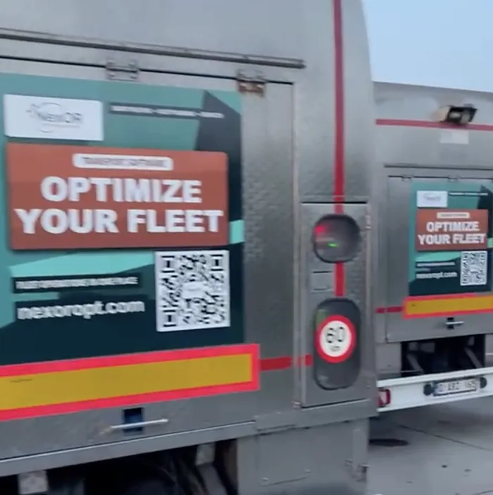 Two trailers side by side, both carrying the panel
